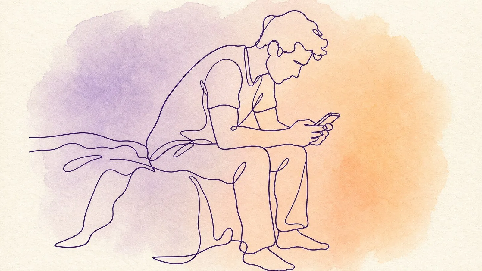 A man sitting on the edge of a bed at night, elbows on his knees, holding a phone with both hands and looking at it