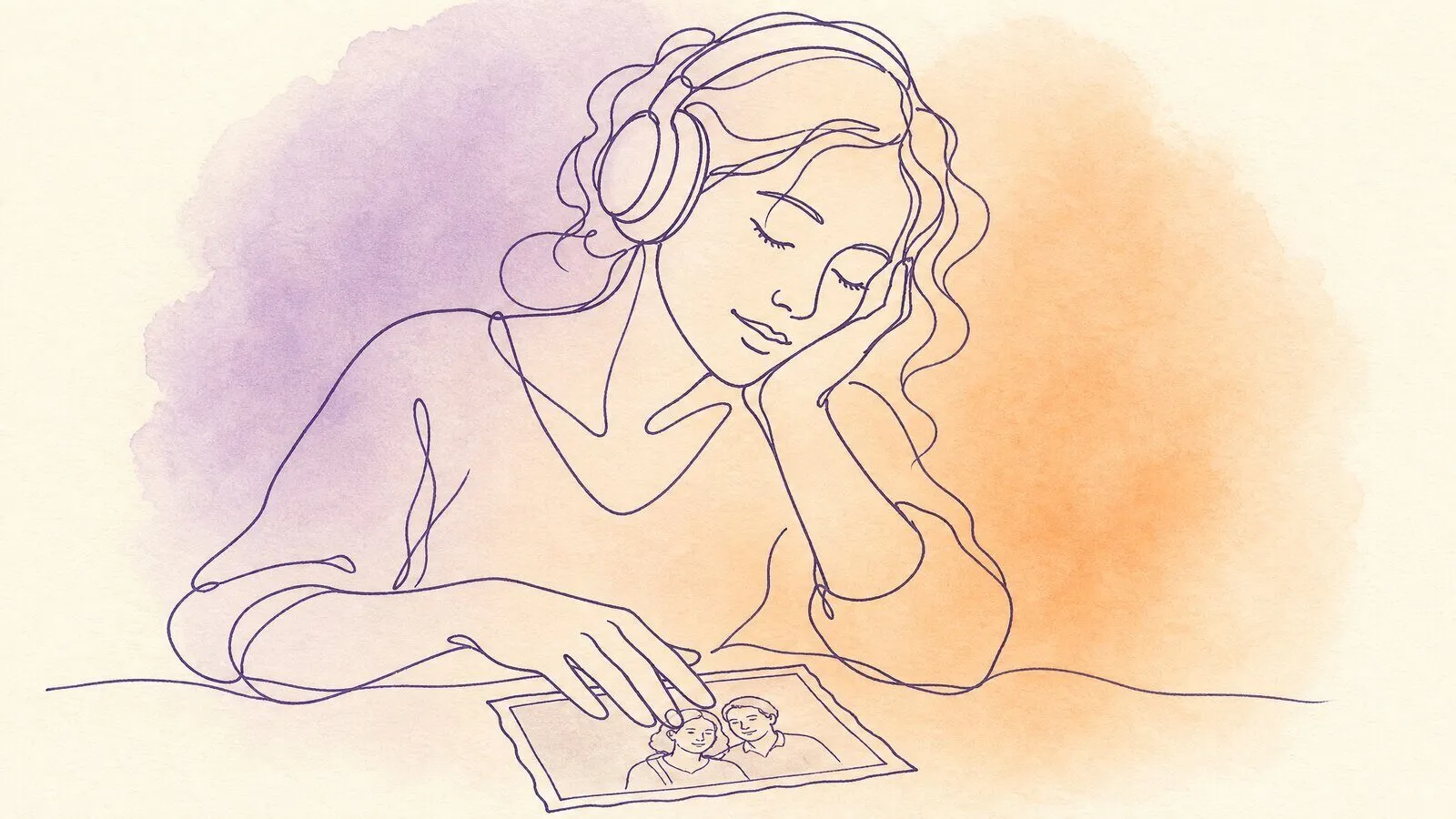 A woman at a kitchen table with headphones on, eyes closed, her hand resting on an old photograph