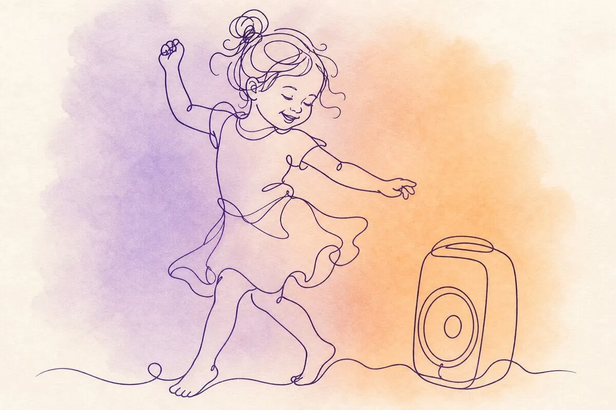 A small girl dancing in a kitchen while a song plays from a speaker