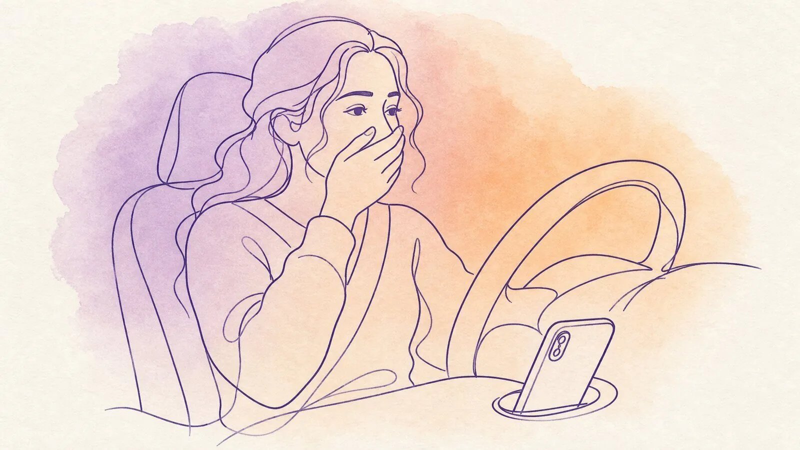 A woman in the driver's seat stopped at a red light, one hand over her mouth, a phone playing in the cup holder